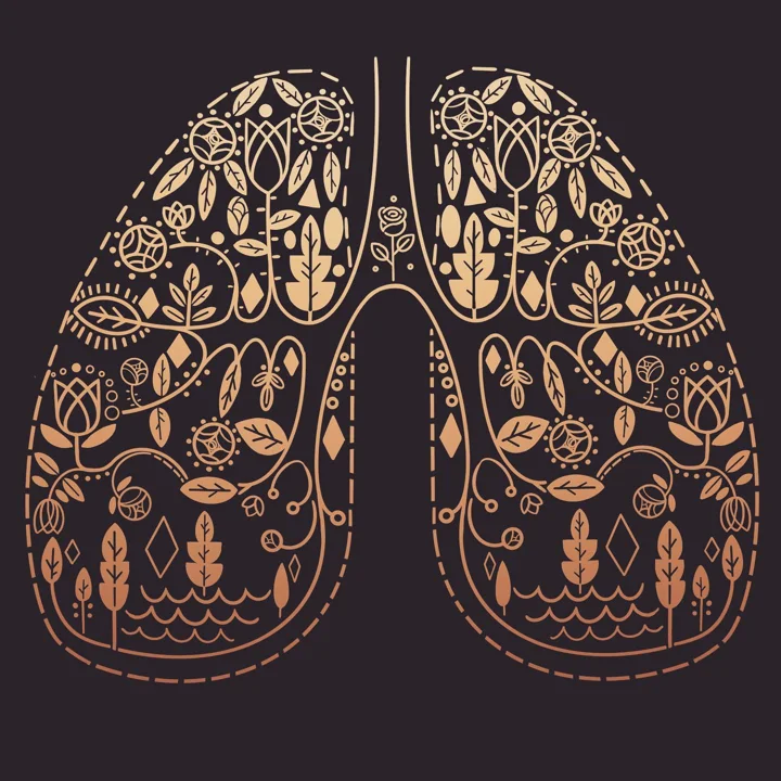 Digital illustration of a pair of lungs in gold line art filled with folk-style flowers and leaves on a dark background.