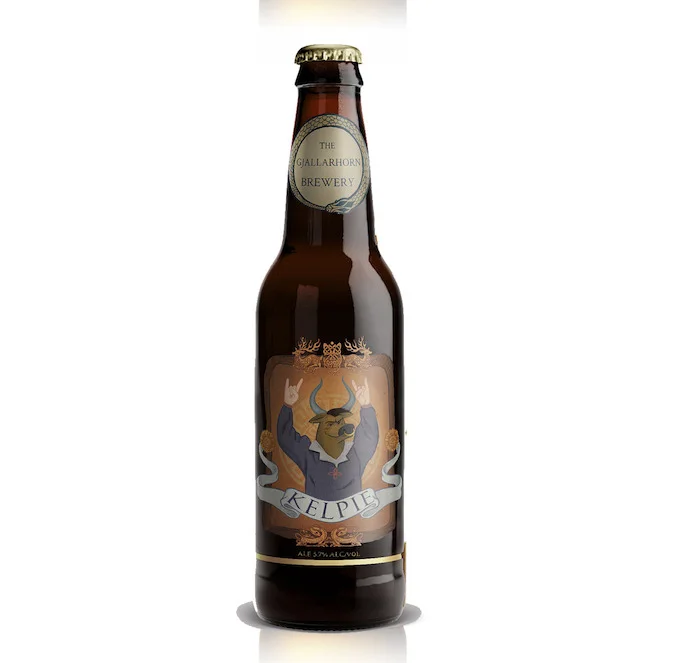 Digital beer label on a bottle mockup, showing a horned beast in a navy shirt giving rock-on hand signs, Kelpie banner below.