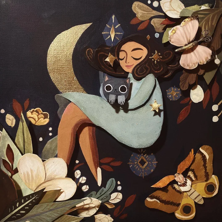 Layered paper collage of a sleeping girl hugging a gray cat beneath a gold crescent moon, among moths and flowers.