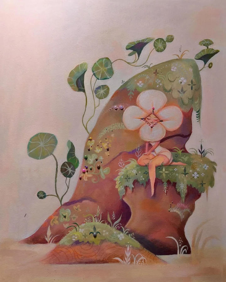 Painting of a tiny flower fairy seated on a moss-covered rock among round green leaves and small plants.