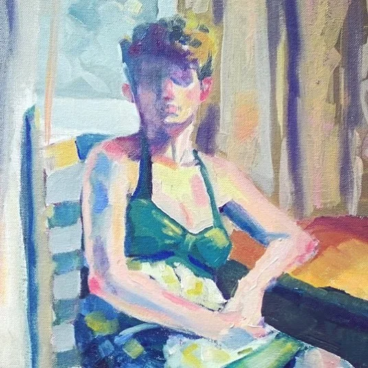 Painting of a short-haired figure in a green halter top seated in a chair, one arm on a table, in thick colorful strokes.