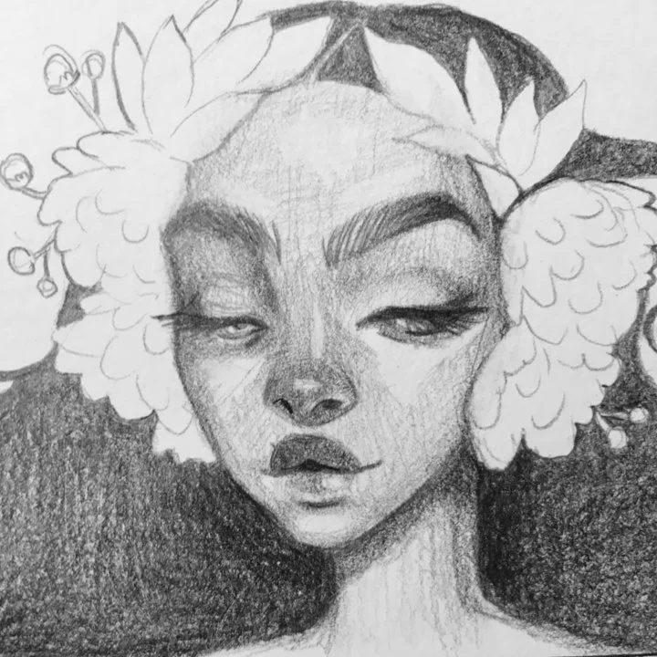 Pencil drawing of a woman with heavy-lidded eyes and full lips, white blossoms framing her head against dark shading.