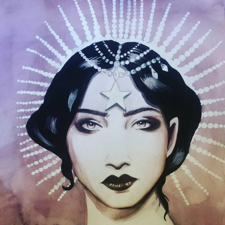 Watercolor portrait of a dark-haired woman with smoky eyes and a star on her brow, framed by radiating dotted rays.