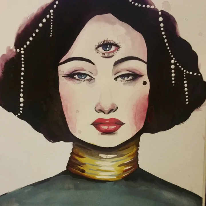 Watercolor portrait of a dark-haired woman with a third eye, pearl strands in her hair, and gold neck rings.